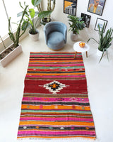 Vintage kilim rug in living room setting, bright colors, wild shaman, soft rug, bold color, Portland, Oregon, rug store, rug shop, local shop, vintage rug, modern kilim, warm colors