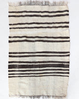 Vintage kilim rug in room decor setting, old rug, antique rug, pastel colors, faded colors, Turkish rug, vintage rug, soft rug, Portland, Oregon, rug store, rug shop, local shop, antique rug