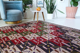Vintage kilim rug in living room setting, bright colors, wild shaman, soft rug, bold color, Portland, Oregon, rug store, rug shop, local shop, vintage rug, modern kilim, warm colors