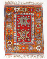 Vintage Turkish rug in a living room setting, pile rug, Turkish rug, vintage rug, portland, rug shop, bright colors, wild shaman, soft rug, bold color, Portland, Oregon, rug store, rug shop, local shop, antique rug