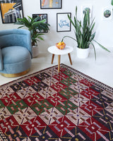 Vintage kilim rug in living room setting, bright colors, wild shaman, soft rug, bold color, Portland, Oregon, rug store, rug shop, local shop, vintage rug, modern kilim, warm colors