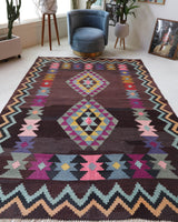 Vintage kilim rug in living room setting, bright colors, wild shaman, soft rug, bold color, Portland, Oregon, rug store, rug shop, local shop, vintage rug, modern kilim, warm colors