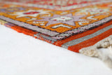 Vintage Turkish rug in a living room setting, pile rug, Turkish rug, vintage rug, portland, rug shop, bright colors, wild shaman, soft rug, bold color, Portland, Oregon, rug store, rug shop, local shop, antique rug