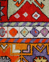 Vintage Turkish rug in a living room setting, pile rug, Turkish rug, vintage rug, portland, rug shop, bright colors, wild shaman, soft rug, bold color, Portland, Oregon, rug store, rug shop, local shop, antique rug