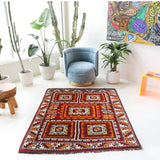 Vintage Turkish rug in a living room setting, pile rug, Turkish rug, vintage rug, portland, rug shop, bright colors, wild shaman, soft rug, bold color, Portland, Oregon, rug store, rug shop, local shop, antique rug