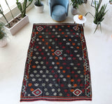 Vintage kilim rug in living room setting, bright colors, wild shaman, soft rug, bold color, Portland, Oregon, rug store, rug shop, local shop, vintage rug, modern kilim, warm colors