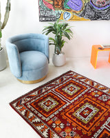 Vintage Turkish rug in a living room setting, pile rug, Turkish rug, vintage rug, portland, rug shop, bright colors, wild shaman, soft rug, bold color, Portland, Oregon, rug store, rug shop, local shop, antique rug