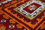 Vintage Turkish rug in a living room setting, pile rug, Turkish rug, vintage rug, portland, rug shop, bright colors, wild shaman, soft rug, bold color, Portland, Oregon, rug store, rug shop, local shop, antique rug