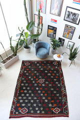 Vintage kilim rug in living room setting, bright colors, wild shaman, soft rug, bold color, Portland, Oregon, rug store, rug shop, local shop, vintage rug, modern kilim, warm colors