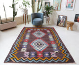 Vintage kilim rug in living room setting, bright colors, wild shaman, soft rug, bold color, Portland, Oregon, rug store, rug shop, local shop, vintage rug, modern kilim, warm colors