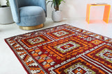 Vintage Turkish rug in a living room setting, pile rug, Turkish rug, vintage rug, portland, rug shop, bright colors, wild shaman, soft rug, bold color, Portland, Oregon, rug store, rug shop, local shop, antique rug