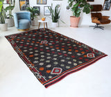 Vintage kilim rug in living room setting, bright colors, wild shaman, soft rug, bold color, Portland, Oregon, rug store, rug shop, local shop, vintage rug, modern kilim, warm colors