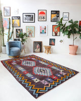 Vintage kilim rug in living room setting, bright colors, wild shaman, soft rug, bold color, Portland, Oregon, rug store, rug shop, local shop, vintage rug, modern kilim, warm colors