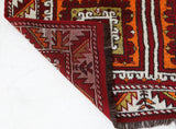 Vintage Turkish rug in a living room setting, pile rug, Turkish rug, vintage rug, portland, rug shop, bright colors, wild shaman, soft rug, bold color, Portland, Oregon, rug store, rug shop, local shop, antique rug