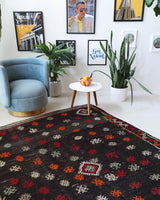 Vintage kilim rug in living room setting, bright colors, wild shaman, soft rug, bold color, Portland, Oregon, rug store, rug shop, local shop, vintage rug, modern kilim, warm colors