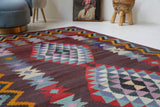 Vintage kilim rug in living room setting, bright colors, wild shaman, soft rug, bold color, Portland, Oregon, rug store, rug shop, local shop, vintage rug, modern kilim, warm colors