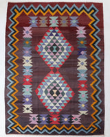 Vintage kilim rug in living room setting, bright colors, wild shaman, soft rug, bold color, Portland, Oregon, rug store, rug shop, local shop, vintage rug, modern kilim, warm colors