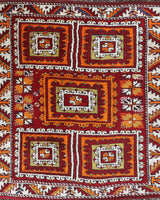 Vintage Turkish rug in a living room setting, pile rug, Turkish rug, vintage rug, portland, rug shop, bright colors, wild shaman, soft rug, bold color, Portland, Oregon, rug store, rug shop, local shop, antique rug