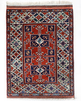 Vintage Turkish rug in a living room setting, pile rug, Turkish rug, vintage rug, portland, rug shop, bright colors, wild shaman, soft rug, bold color, Portland, Oregon, rug store, rug shop, local shop, antique rug