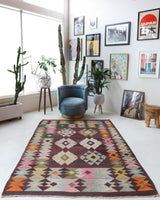 Vintage kilim rug in living room setting, bright colors, wild shaman, soft rug, bold color, Portland, Oregon, rug store, rug shop, local shop, vintage rug, modern kilim, warm colors