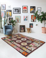 Vintage kilim rug in living room setting, bright colors, wild shaman, soft rug, bold color, Portland, Oregon, rug store, rug shop, local shop, vintage rug, modern kilim, warm colors