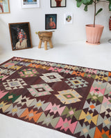 Vintage kilim rug in living room setting, bright colors, wild shaman, soft rug, bold color, Portland, Oregon, rug store, rug shop, local shop, vintage rug, modern kilim, warm colors