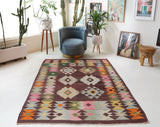 Vintage kilim rug in living room setting, bright colors, wild shaman, soft rug, bold color, Portland, Oregon, rug store, rug shop, local shop, vintage rug, modern kilim, warm colors