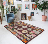 Vintage kilim rug in living room setting, bright colors, wild shaman, soft rug, bold color, Portland, Oregon, rug store, rug shop, local shop, vintage rug, modern kilim, warm colors