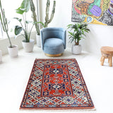 Vintage Turkish rug in a living room setting, pile rug, Turkish rug, vintage rug, portland, rug shop, bright colors, wild shaman, soft rug, bold color, Portland, Oregon, rug store, rug shop, local shop, antique rug