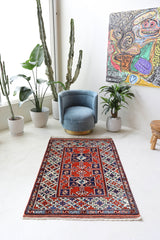 Vintage Turkish rug in a living room setting, pile rug, Turkish rug, vintage rug, portland, rug shop, bright colors, wild shaman, soft rug, bold color, Portland, Oregon, rug store, rug shop, local shop, antique rug