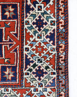 Vintage Turkish rug in a living room setting, pile rug, Turkish rug, vintage rug, portland, rug shop, bright colors, wild shaman, soft rug, bold color, Portland, Oregon, rug store, rug shop, local shop, antique rug