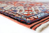 Vintage Turkish rug in a living room setting, pile rug, Turkish rug, vintage rug, portland, rug shop, bright colors, wild shaman, soft rug, bold color, Portland, Oregon, rug store, rug shop, local shop, antique rug