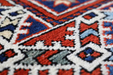Vintage Turkish rug in a living room setting, pile rug, Turkish rug, vintage rug, portland, rug shop, bright colors, wild shaman, soft rug, bold color, Portland, Oregon, rug store, rug shop, local shop, antique rug