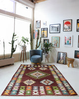 Vintage kilim rug in living room setting, bright colors, wild shaman, soft rug, bold color, Portland, Oregon, rug store, rug shop, local shop, vintage rug, modern kilim, warm colors