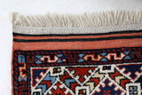 Vintage Turkish rug in a living room setting, pile rug, Turkish rug, vintage rug, portland, rug shop, bright colors, wild shaman, soft rug, bold color, Portland, Oregon, rug store, rug shop, local shop, antique rug