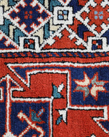 Vintage Turkish rug in a living room setting, pile rug, Turkish rug, vintage rug, portland, rug shop, bright colors, wild shaman, soft rug, bold color, Portland, Oregon, rug store, rug shop, local shop, antique rug