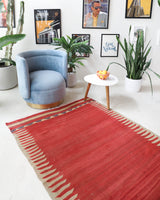 Vintage kilim rug in room decor setting, old rug, antique rug, pastel colors, faded colors, Turkish rug, vintage rug, soft rug, Portland, Oregon, rug store, rug shop, local shop, bold colors, bright colors, faded colors