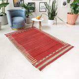 Vintage kilim rug in room decor setting, old rug, antique rug, pastel colors, faded colors, Turkish rug, vintage rug, soft rug, Portland, Oregon, rug store, rug shop, local shop, bold colors, bright colors, faded colors