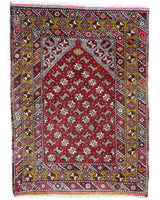 Vintage Turkish rug in living room setting, old rug, antique rug, pastel colors, faded colors, Turkish rug, vintage rug, soft rug, Portland, Oregon, rug store, rug shop, local shop