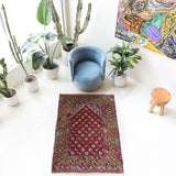 Vintage Turkish rug in living room setting, old rug, antique rug, pastel colors, faded colors, Turkish rug, vintage rug, soft rug, Portland, Oregon, rug store, rug shop, local shop