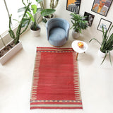 Vintage kilim rug in room decor setting, old rug, antique rug, pastel colors, faded colors, Turkish rug, vintage rug, soft rug, Portland, Oregon, rug store, rug shop, local shop, bold colors, bright colors, faded colors