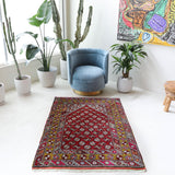 Vintage Turkish rug in living room setting, old rug, antique rug, pastel colors, faded colors, Turkish rug, vintage rug, soft rug, Portland, Oregon, rug store, rug shop, local shop