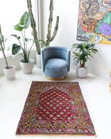 Vintage Turkish rug in living room setting, old rug, antique rug, pastel colors, faded colors, Turkish rug, vintage rug, soft rug, Portland, Oregon, rug store, rug shop, local shop