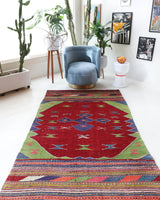 Vintage kilim rug in living room setting, bright colors, wild shaman, soft rug, bold color, Portland, Oregon, rug store, rug shop, local shop, vintage rug, modern kilim, warm colors