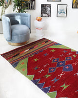 Vintage kilim rug in living room setting, bright colors, wild shaman, soft rug, bold color, Portland, Oregon, rug store, rug shop, local shop, vintage rug, modern kilim, warm colors