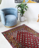 Vintage Turkish rug in living room setting, old rug, antique rug, pastel colors, faded colors, Turkish rug, vintage rug, soft rug, Portland, Oregon, rug store, rug shop, local shop