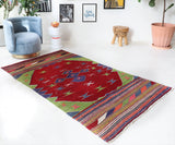 Vintage kilim rug in living room setting, bright colors, wild shaman, soft rug, bold color, Portland, Oregon, rug store, rug shop, local shop, vintage rug, modern kilim, warm colors