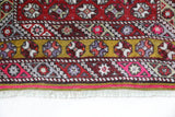 Vintage Turkish rug in living room setting, old rug, antique rug, pastel colors, faded colors, Turkish rug, vintage rug, soft rug, Portland, Oregon, rug store, rug shop, local shop