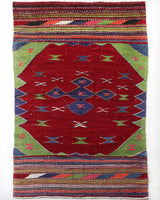 Vintage kilim rug in living room setting, bright colors, wild shaman, soft rug, bold color, Portland, Oregon, rug store, rug shop, local shop, vintage rug, modern kilim, warm colors