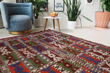 Vintage kilim rug in living room setting, bright colors, wild shaman, soft rug, bold color, Portland, Oregon, rug store, rug shop, local shop, vintage rug, modern kilim, warm colors